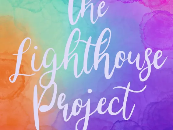 Rainbow watercolor background with white cursive text "The Lighthouse Project"